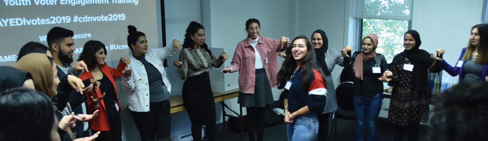 group of young people learning about voting