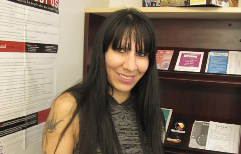 smiling outreach worker in the office