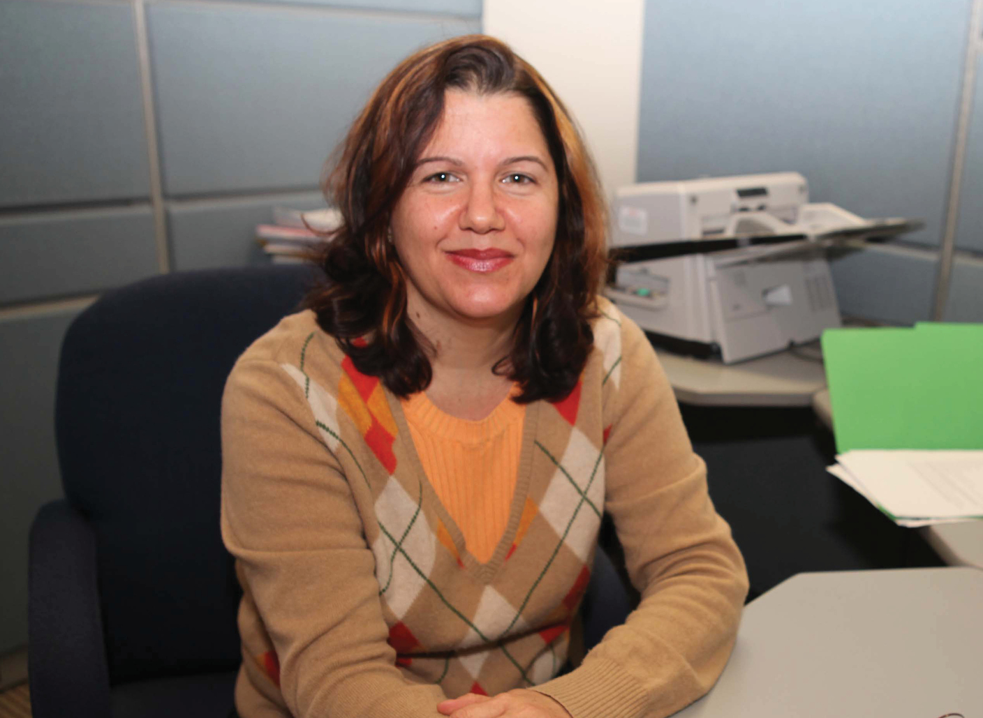 woman sitting at an office desk