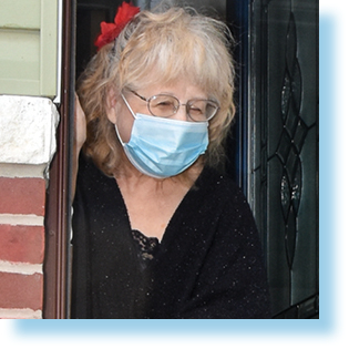 woman standing at front door