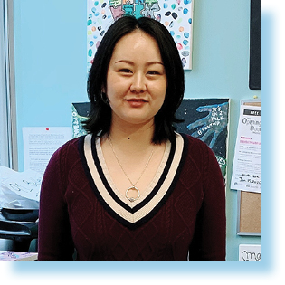 smiling woman in Newcomer Centre