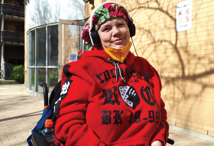 woman in wheelchair outside