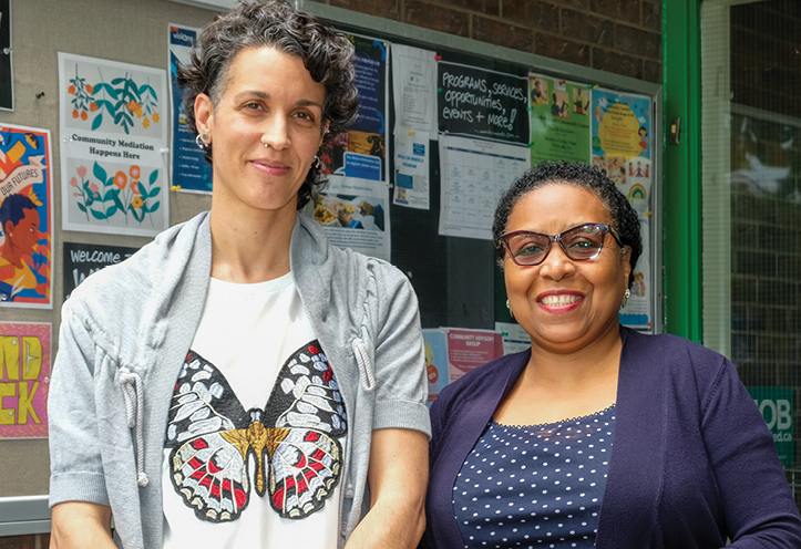 two women standing outside Warden Woods Community Centre