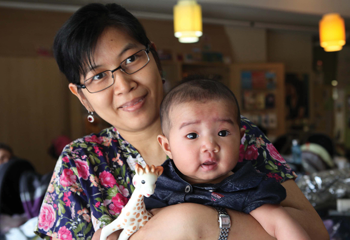 woman holding baby boy