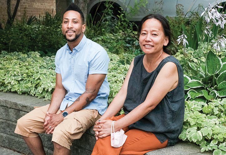 Man and woman sitting in a garden