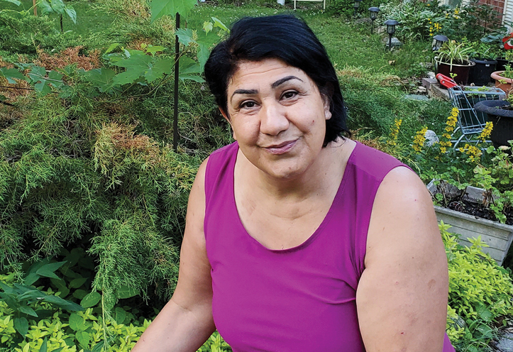 Woman sitting in garden