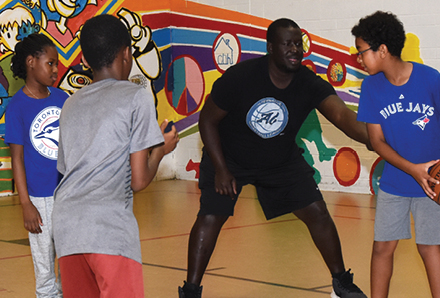 youth playing basketball