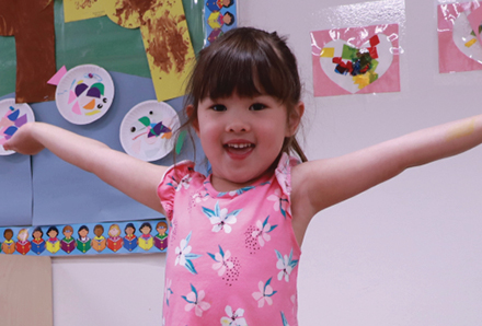young girl having fun in the Yonge & Sheppard Child Care Centre
