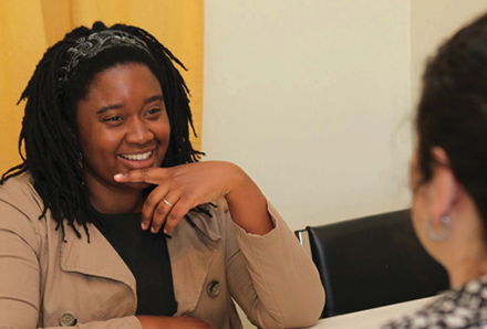 woman talking to a volunteer mediator