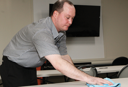 man working after completing the Enhanced Services employment program