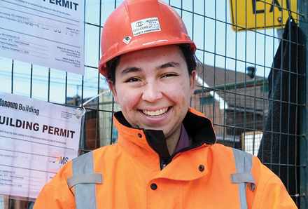 young woman on the job after graduating from our Youth Job Connection employment program