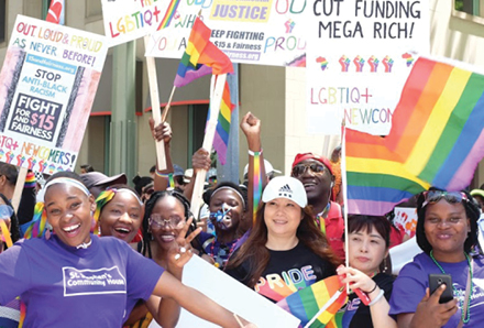 Rainbow Connect staff and participants having fun during the Pride Parade