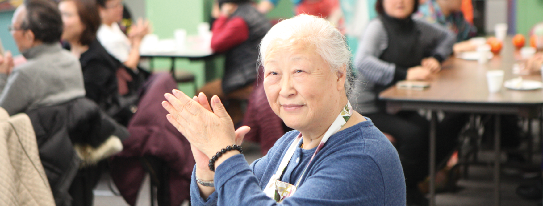 senior in community kitchen