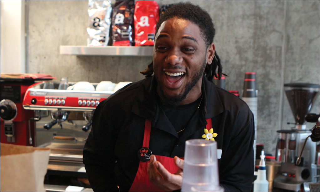 youth working at a coffee shop