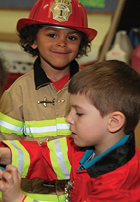 children dressing in costumes