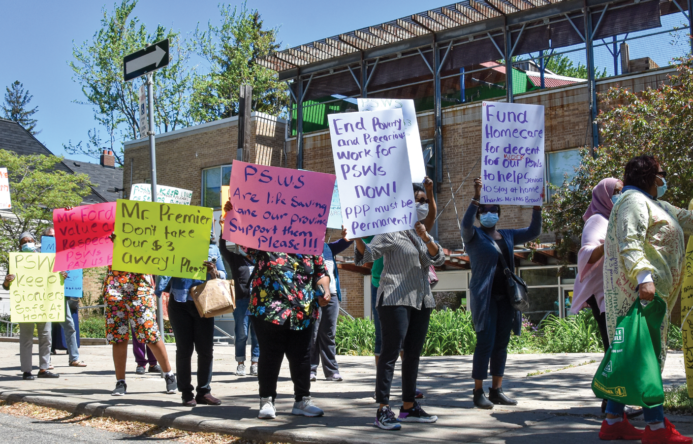 people marching in support of fair wages for personal support workers