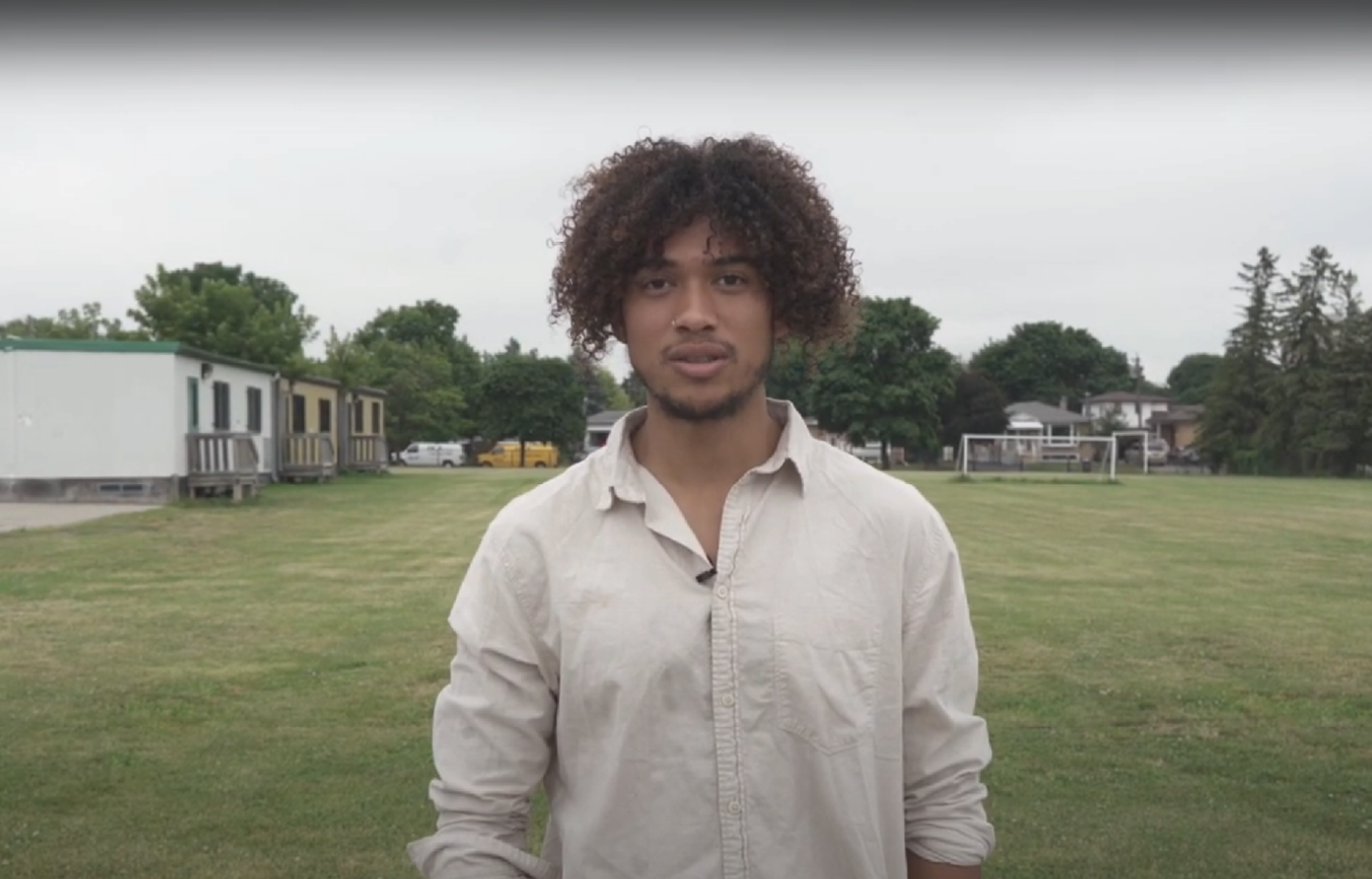 young man standing in park